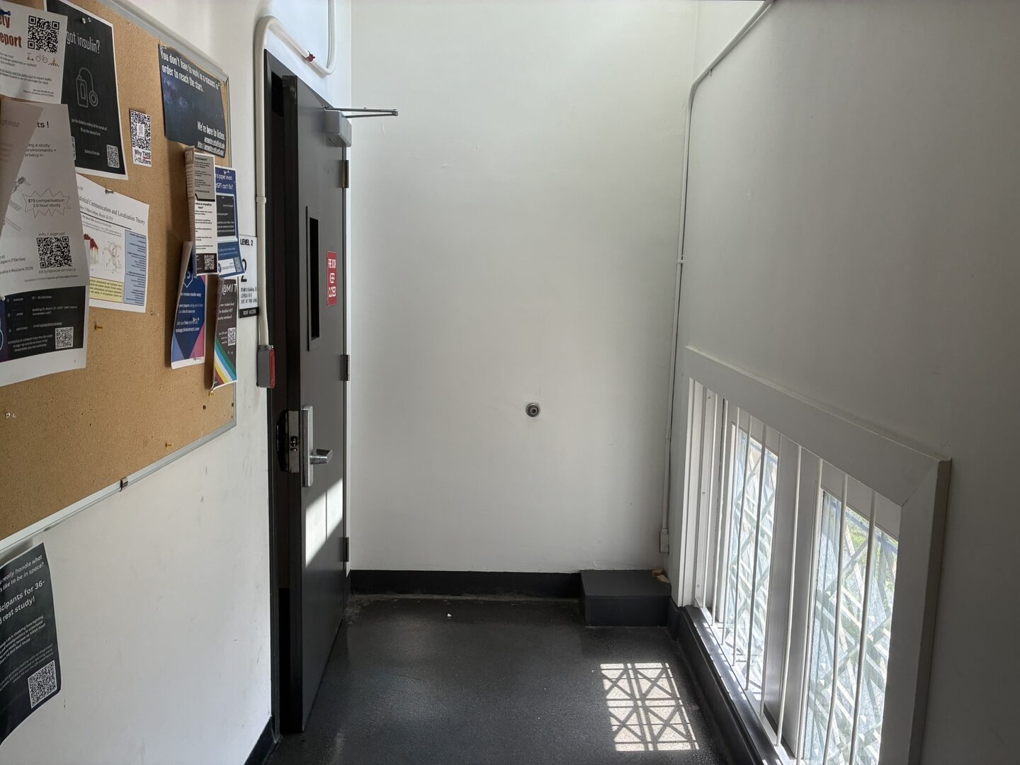 Hallway with windows along one side