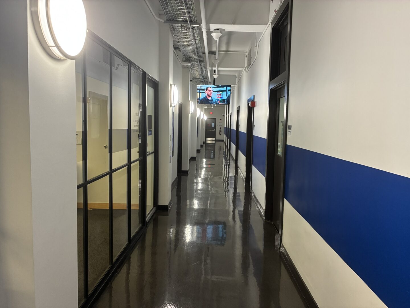 Near the end of the hallway, doors ahead